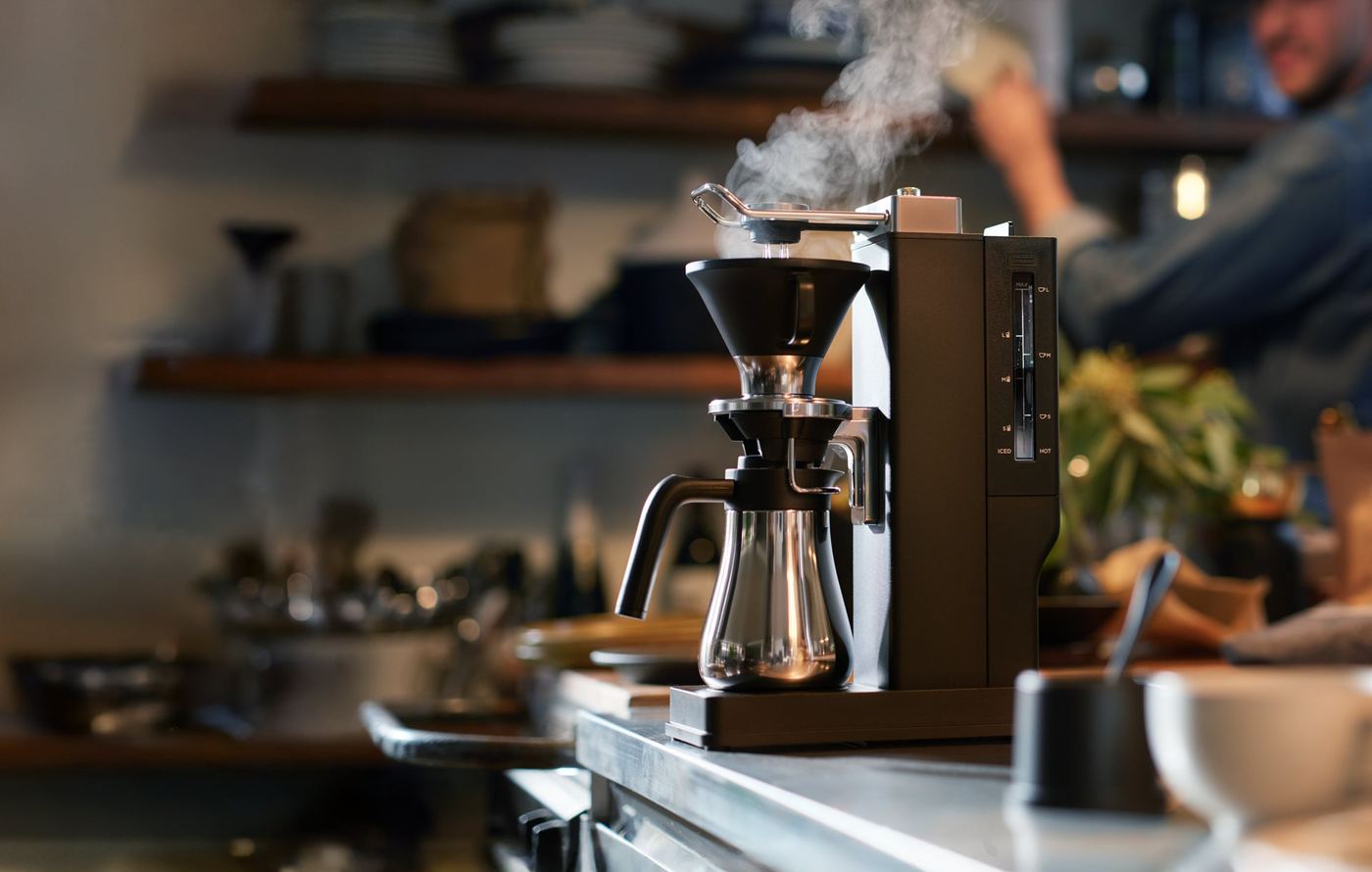 BALMUDA The Brew steaming on a kitchen counter
