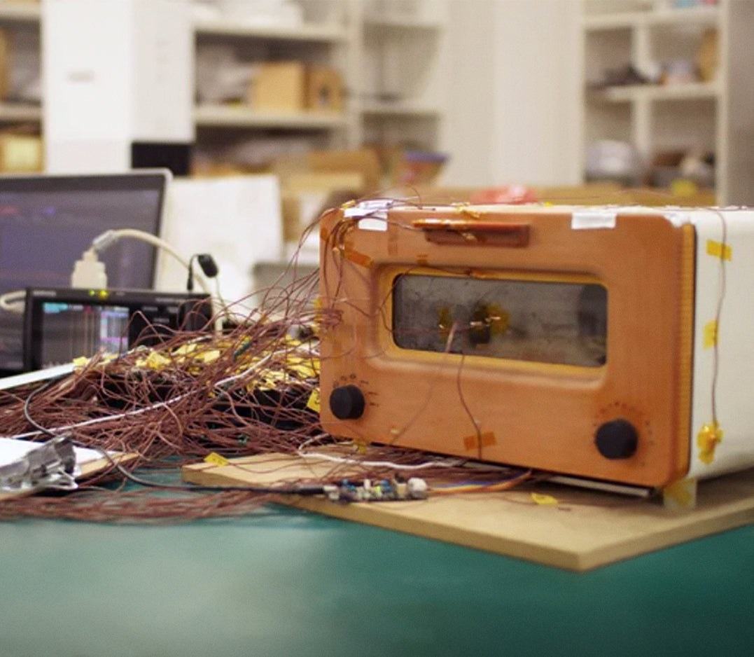 An early toaster prototype on a workbench