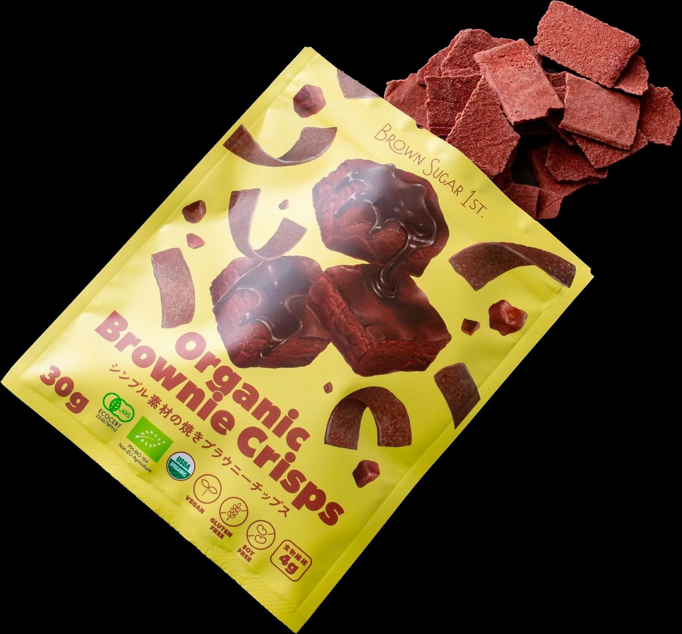 An open pouch of Organic Brownie Crisps spilling crisps