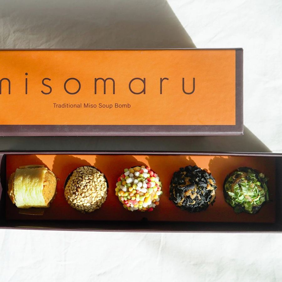 The orange MISOMARU Traditional box, open, with five miso balls