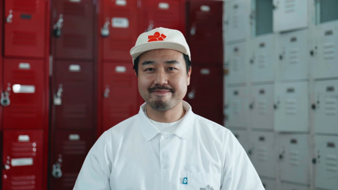 Hisashi Murakami smiling in a white chef’s shirt