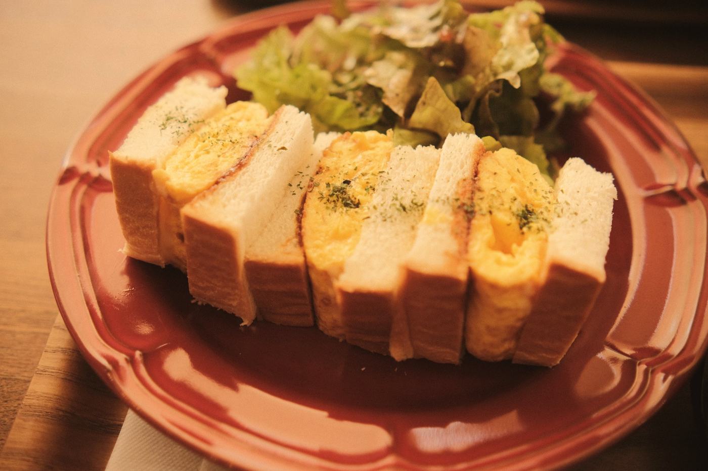 A Japanese tamago sando on soft white bread
