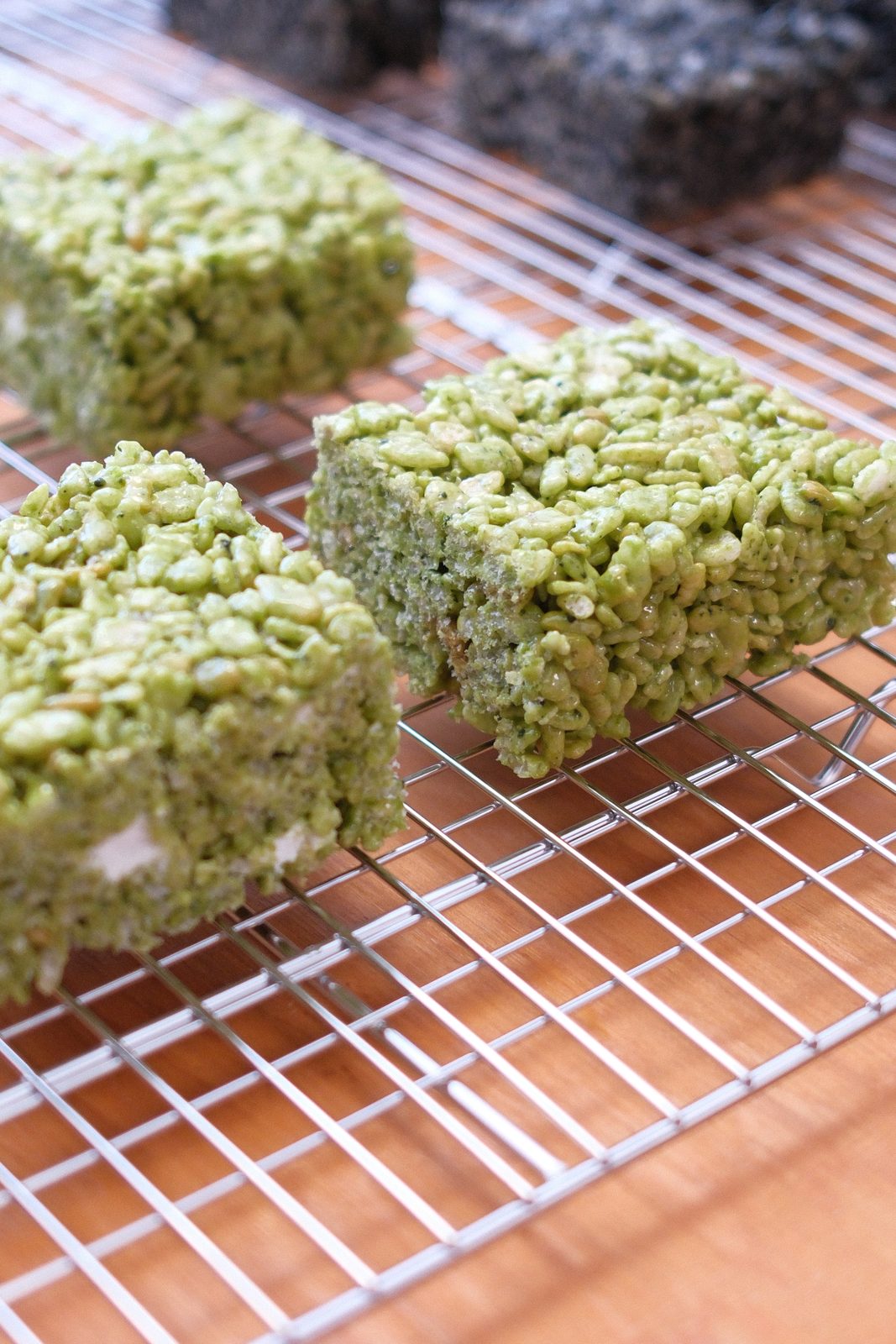 Matcha rice crispies cooling on a rack
